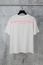 White short-sleeve T-shirt with pink graphic lettering across the chest