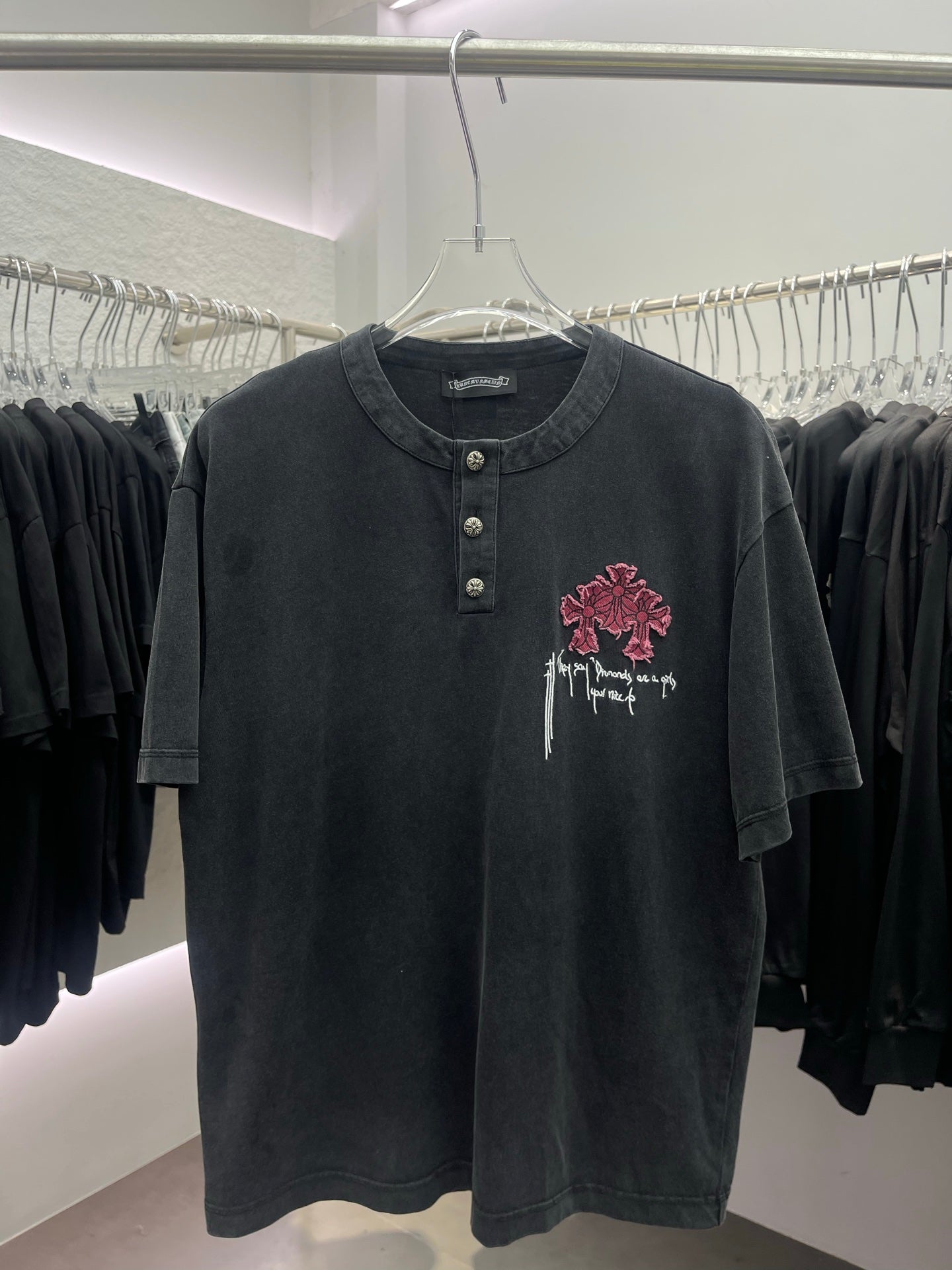 Short-sleeve T-shirt, dark with pink cross embroidery and henley buttons