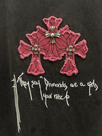 Short-sleeve T-shirt back embroidery close-up: pink cross motifs with white script