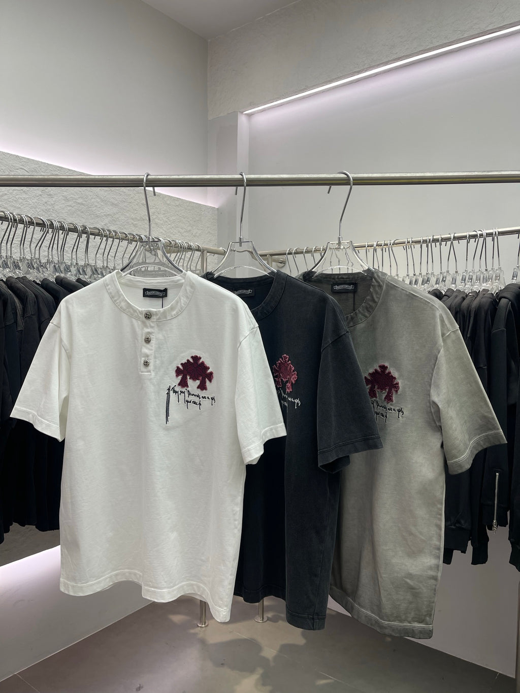 Short-sleeve T-shirts (white and dark) with pink cross chest embroidery