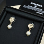 Chanel CC gold-tone pearl drop earrings, front view
