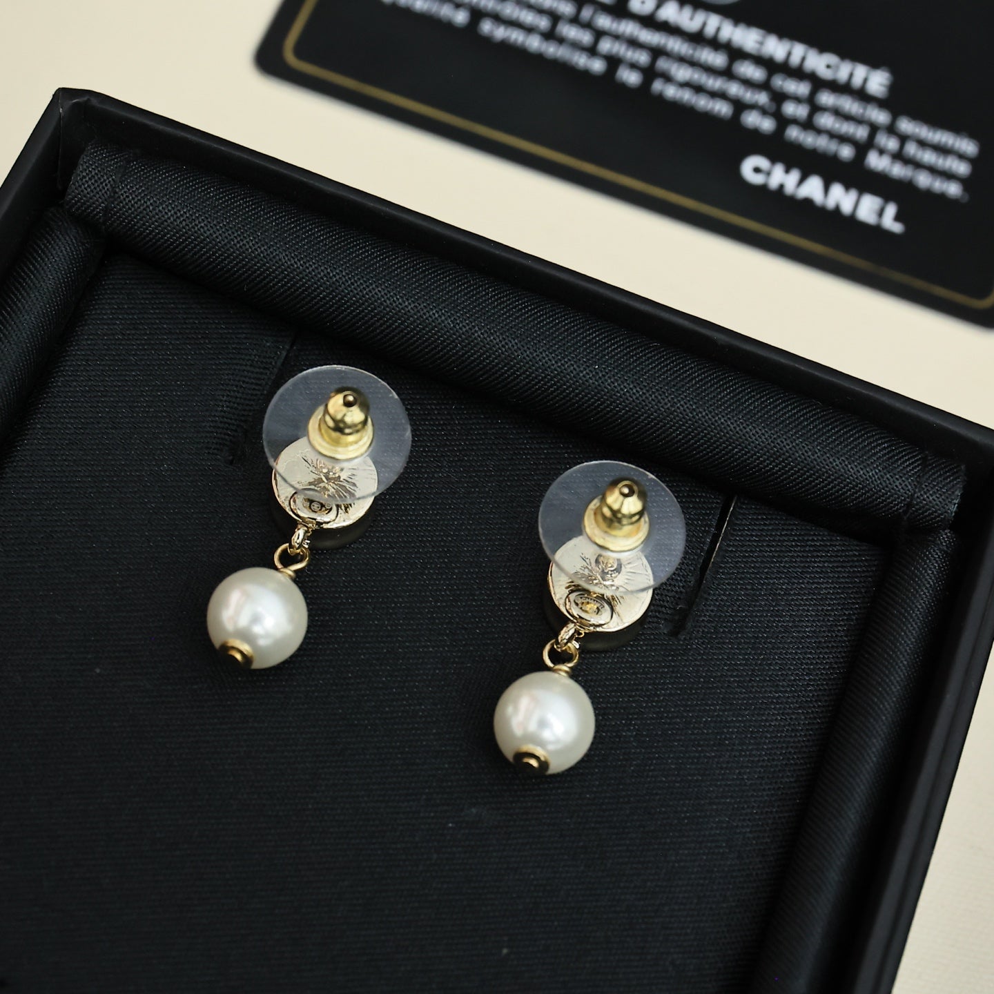 Pair of Chanel CC gold-tone pearl drop earrings in black box