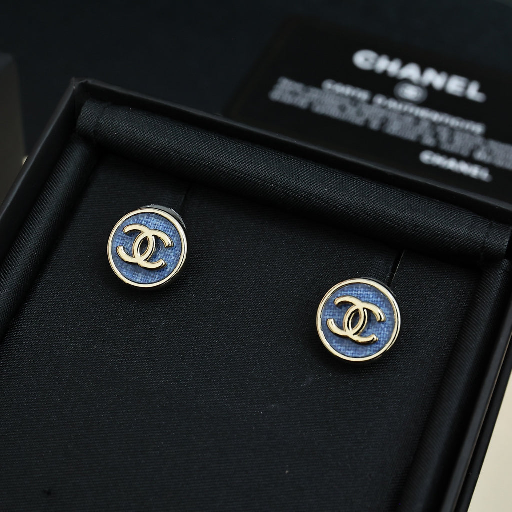 Chanel logo stud earrings with blue enamel in gold-tone circular settings