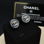 Chanel logo stud earrings with blue enamel and gold-tone round backs