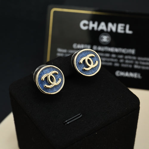 Chanel logo stud earrings with blue enamel and gold-tone round backs