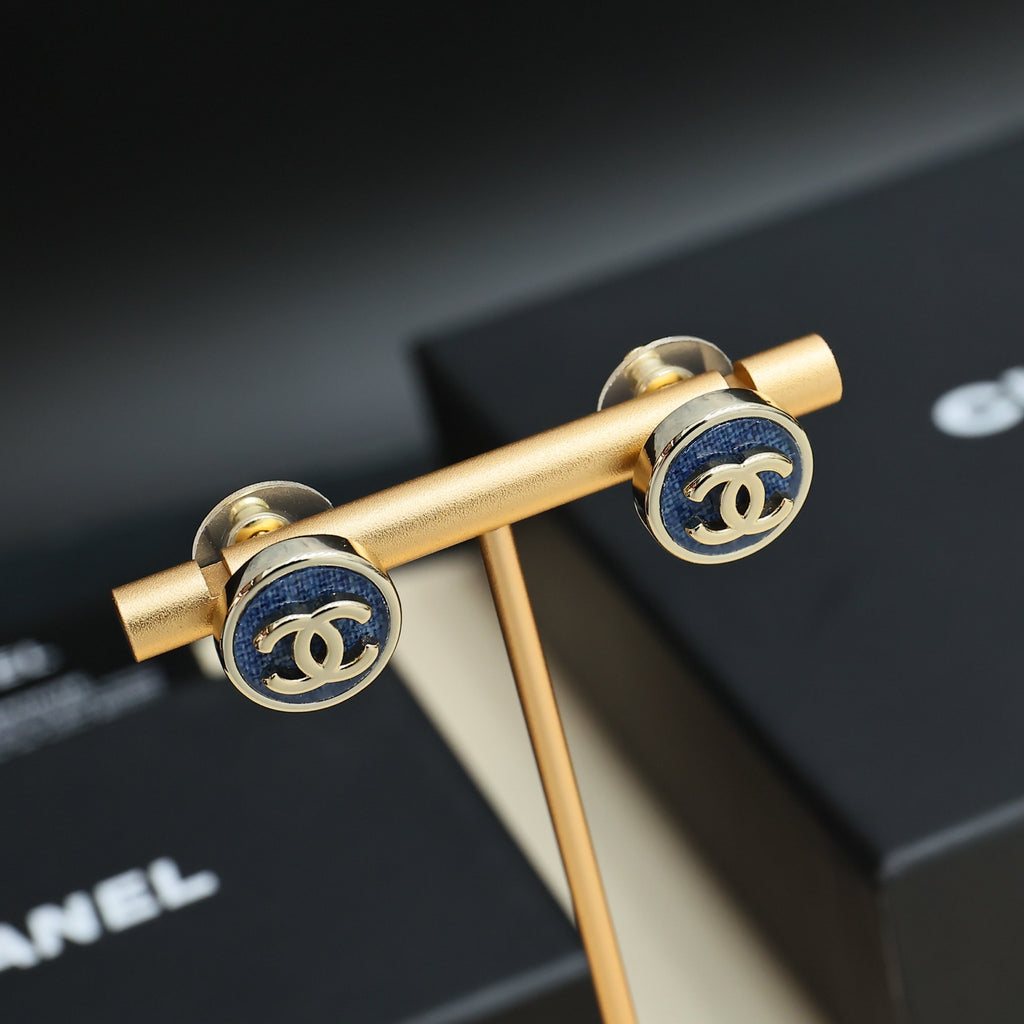 Chanel logo cuff-style earrings with blue enamel and gold-tone hardware