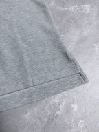 Dior polo shirt hem with short sleeve cuff, light gray knit