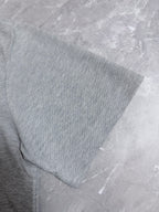 Dior polo shirt side and sleeve hem, light gray knit fabric