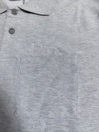 Dior polo shirt chest pocket detail with embroidered logo, light gray knit