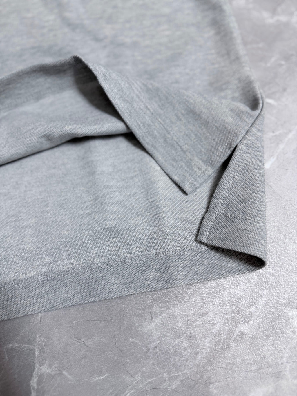 Dior polo shirt collar and shoulder seam detail, light gray melange