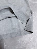 Dior polo shirt collar and shoulder seam detail, light gray melange