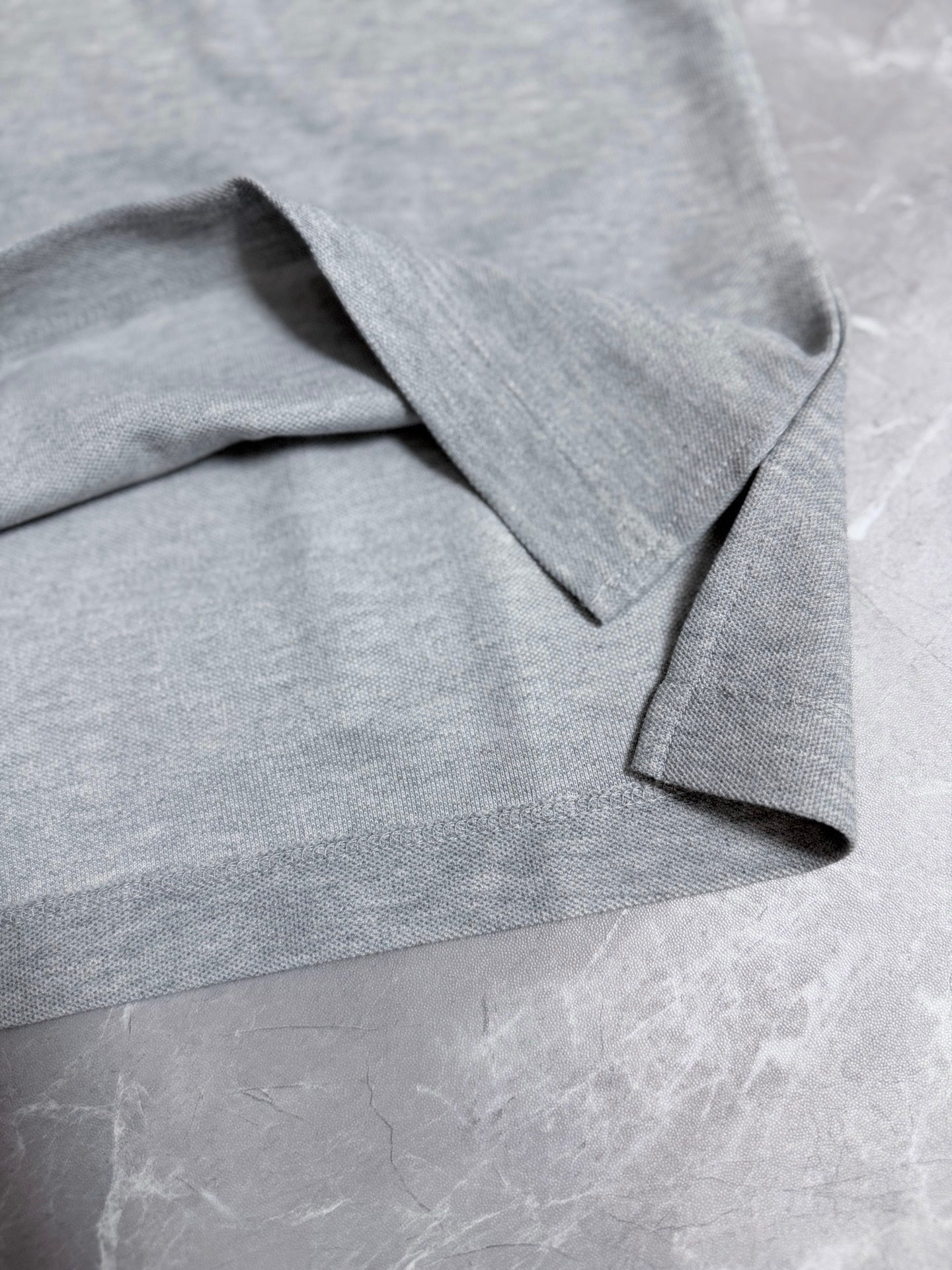 Dior polo shirt collar and shoulder seam detail, light gray melange