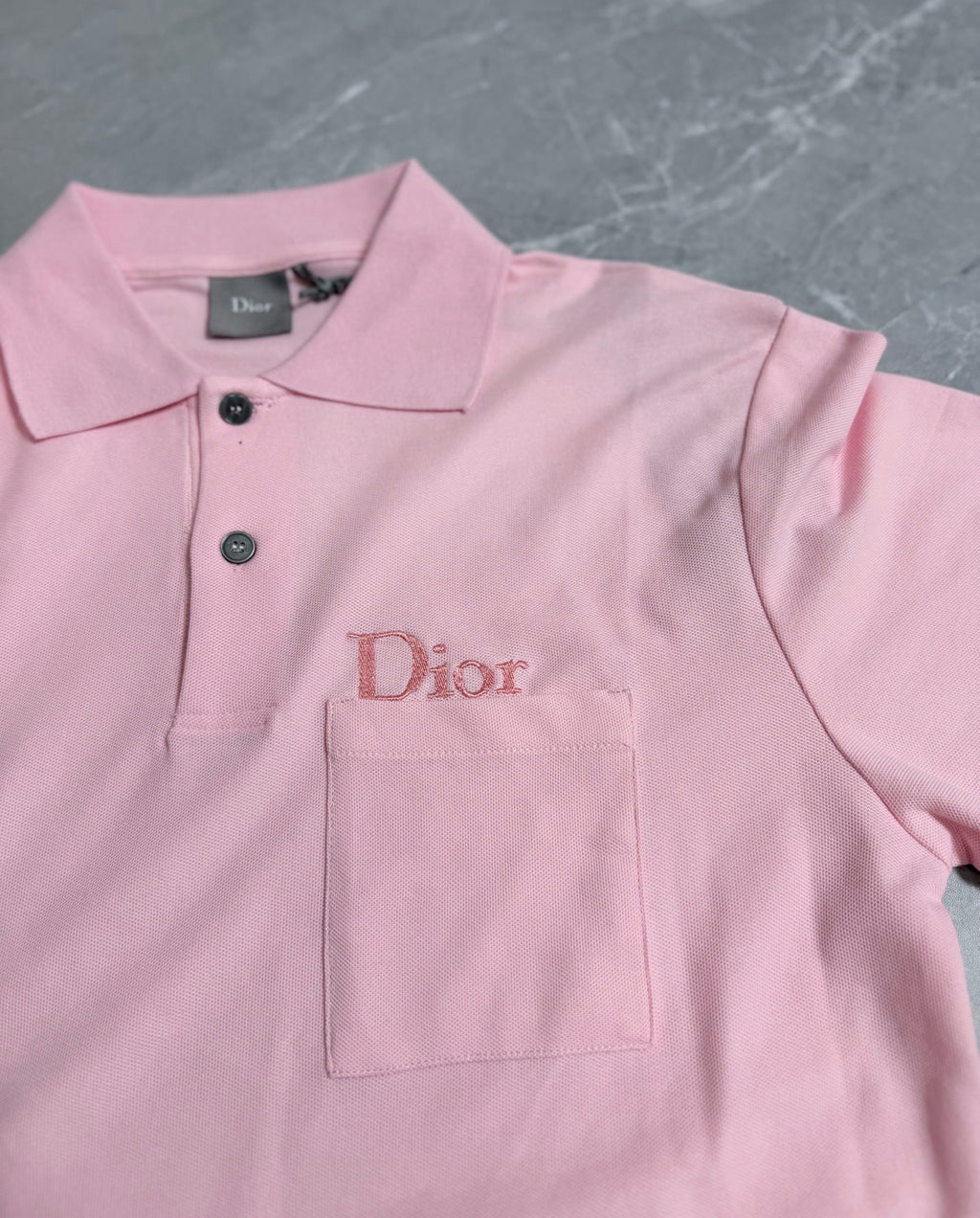 Pink Dior polo shirt front with embroidered Dior logo pocket