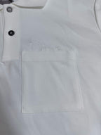 Dior white polo shirt chest pocket with black buttons