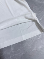 Dior white polo shirt sleeve and side panel stitching detail