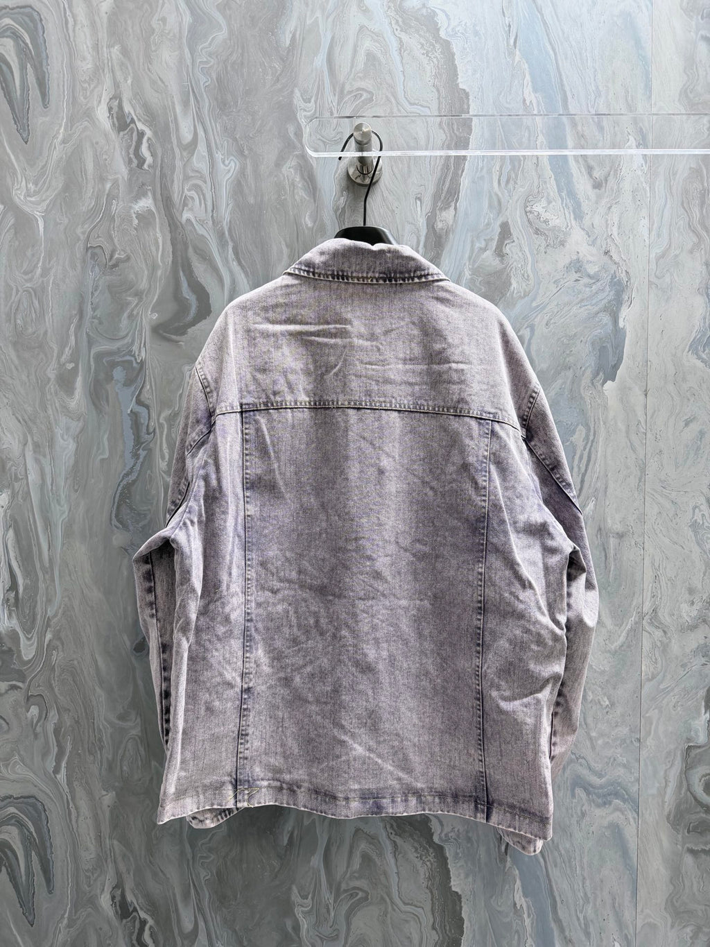 Louis Vuitton denim jacket back view with yoke seam and button closure