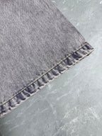 Light-wash Louis Vuitton denim pants hem with stitched cuff and seam detail