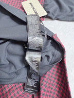 Long-sleeve jacket close-up: dark gray hood with burgundy check side, hanging care tag