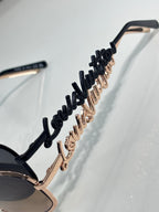 Louis Vuitton sunglasses side temple with black detailing and rose gold accents