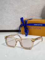 Louis Vuitton glasses, light gold frame with clear lenses