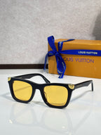 Louis Vuitton sunglasses, black frame with yellow lenses