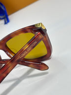 Louis Vuitton glasses, tortoiseshell frame with yellow-tinted lens