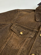 Louis Vuitton brown denim jacket close-up of shoulder yoke and flap chest pocket