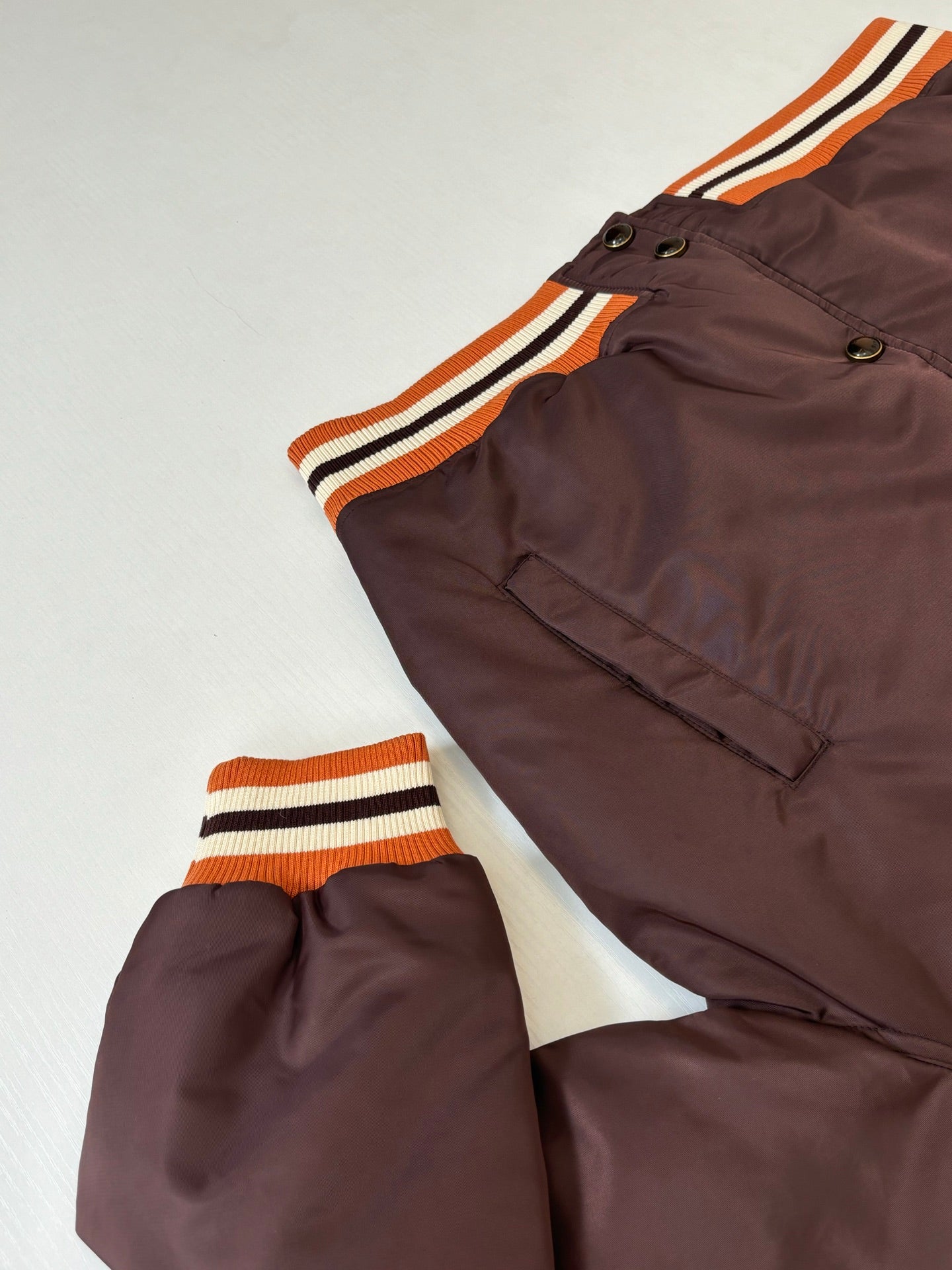 Louis Vuitton long bomber jacket sleeve and hem, dark brown with orange and striped trim