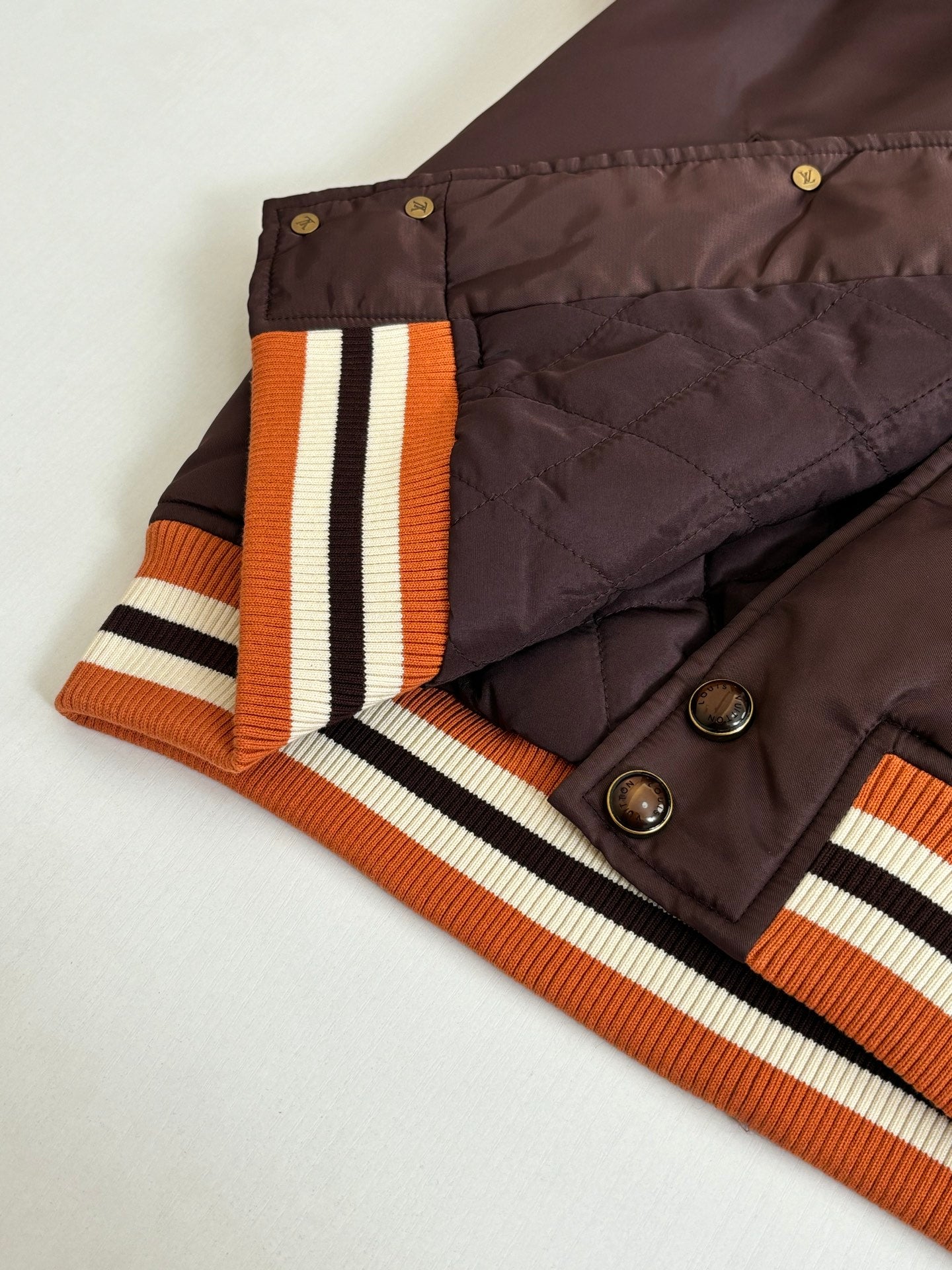 Louis Vuitton long bomber jacket quilted lining near hem, dark brown with striped rib