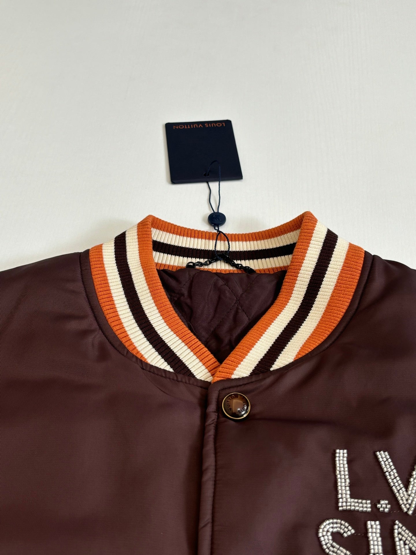 Louis Vuitton long bomber jacket collar and chest logo, dark brown with striped trim