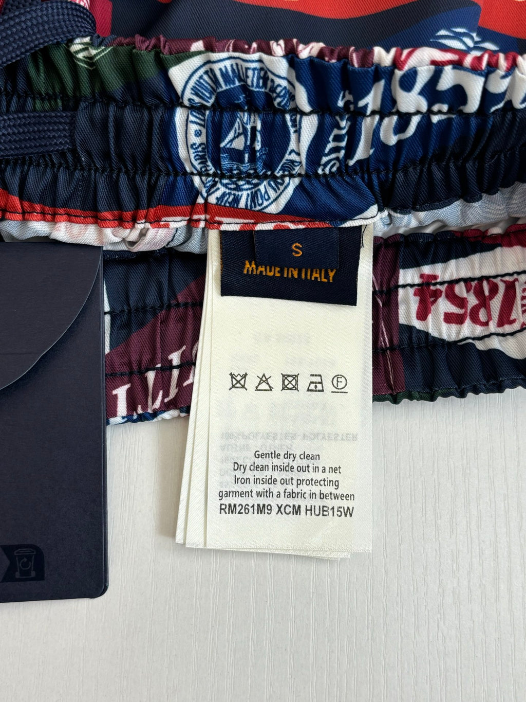 Louis Vuitton shorts size tag marked S and Made in Italy care label