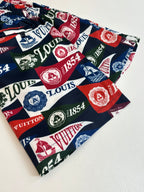 Louis Vuitton logo-print shorts fabric, navy and red with white logos and emblems
