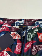 Louis Vuitton logo-print shorts waistband close-up with elastic hem and drawstring