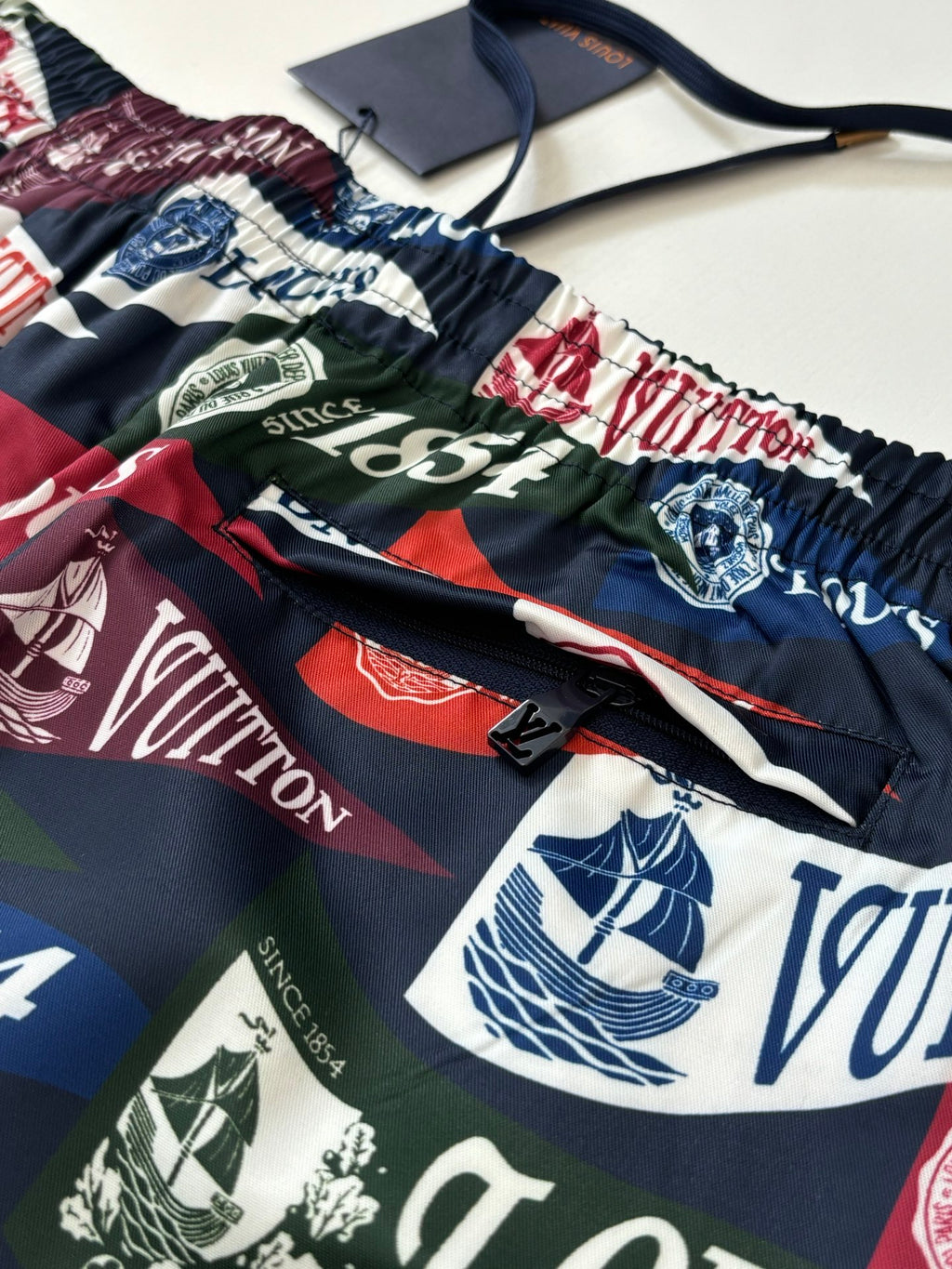 Louis Vuitton logo-print shorts waistband with black drawstring and gathered elastic