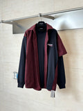 Balenciaga long-sleeve shirt with red-and-black check yoke and black sleeves