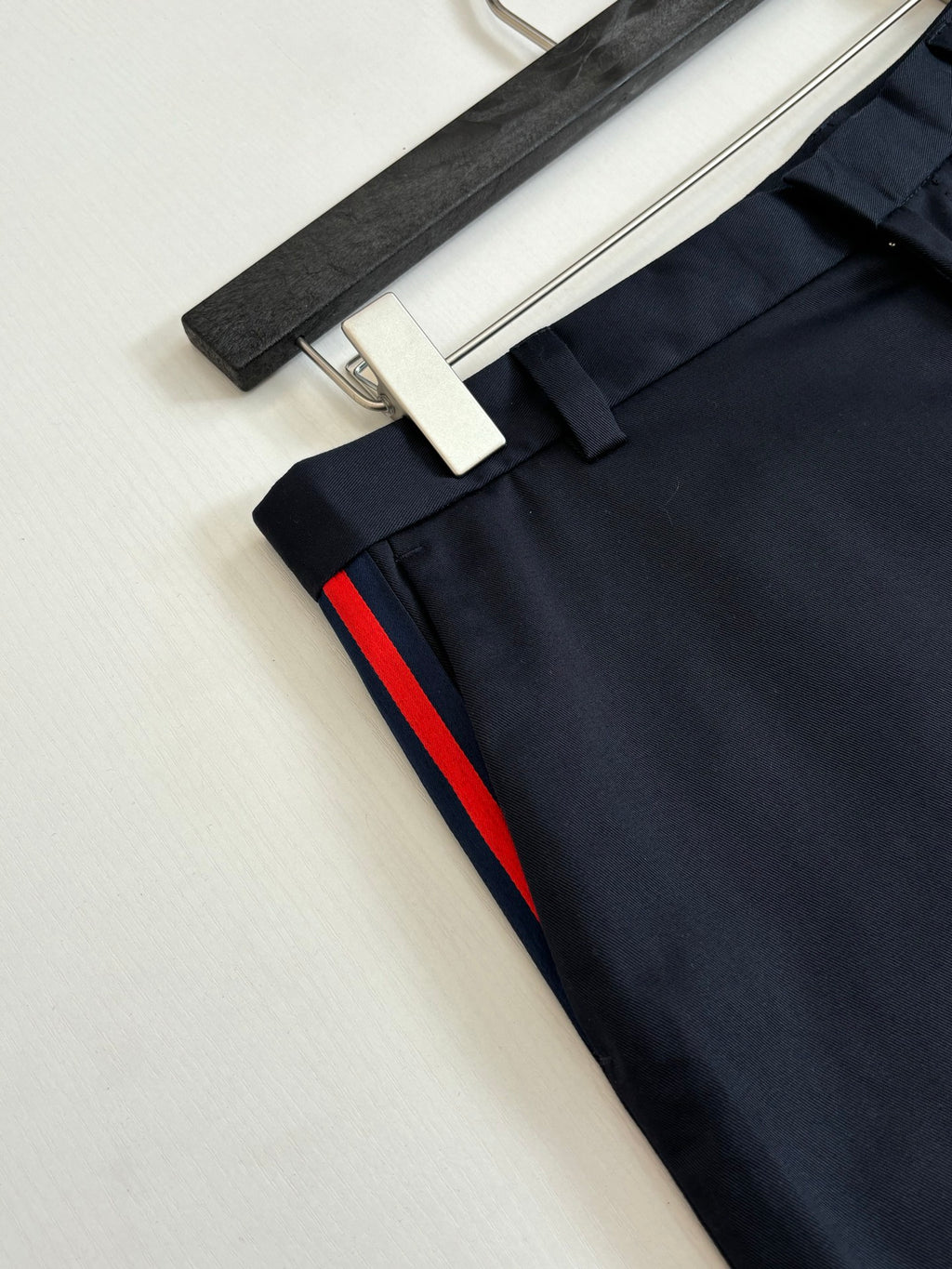Gucci navy pants cuff detail with red side stripe and narrow trim