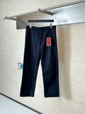 Gucci navy pants with front button, belt loops, and straight legs