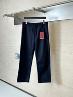 Gucci navy pants with front button, belt loops, and straight legs