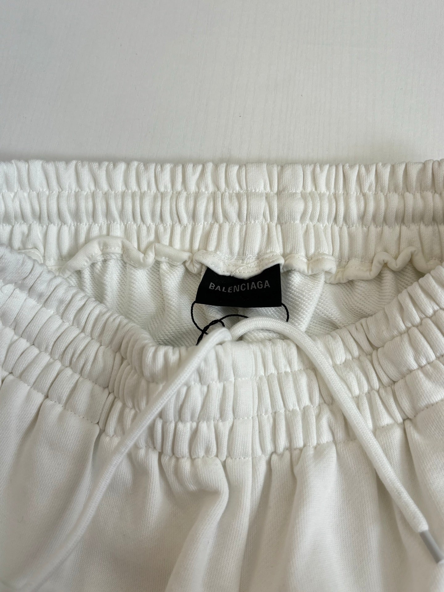 White gathered elastic waistband with drawstring and Balenciaga label