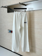 White wide-leg drawstring pants with elastic waistband