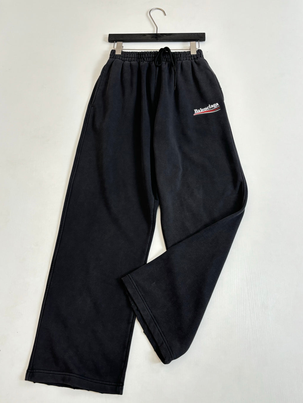 Black Balenciaga track pants, elastic waist and side logo patch