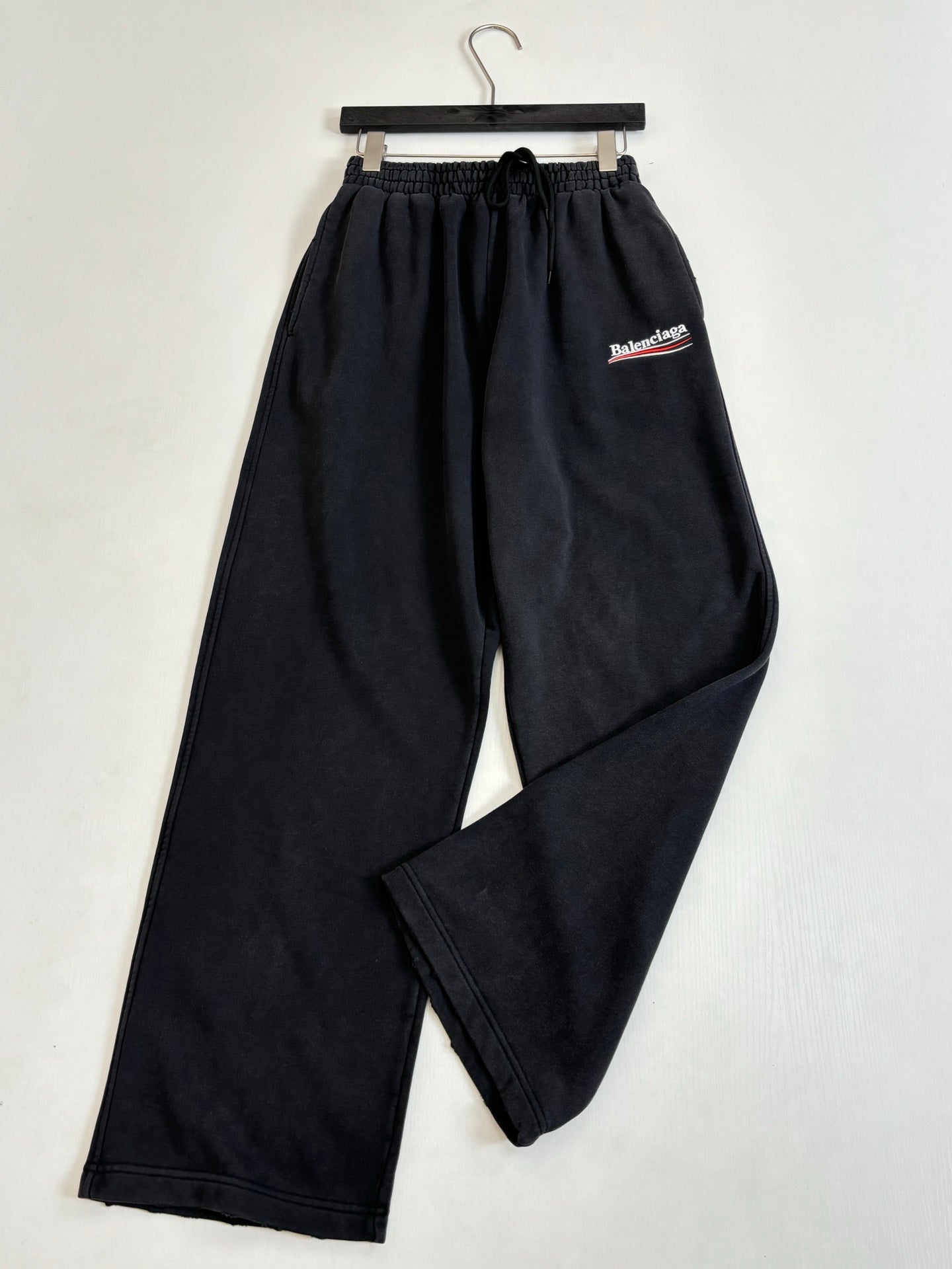 Black Balenciaga track pants, elastic waist and side logo patch