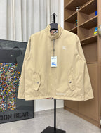 Burberry long jacket, pale yellow, full-zip front with stand collar and chest logo