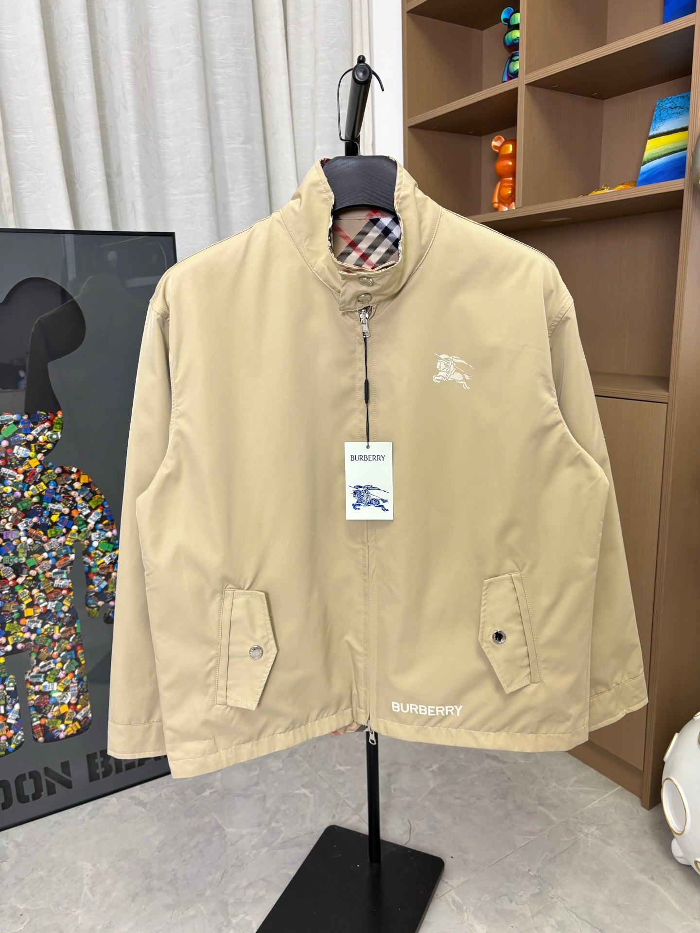 Burberry long jacket, pale yellow, stand collar, full-zip front, chest pocket flaps