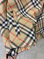 Burberry long jacket close-up of beige, navy, and red plaid hood lining