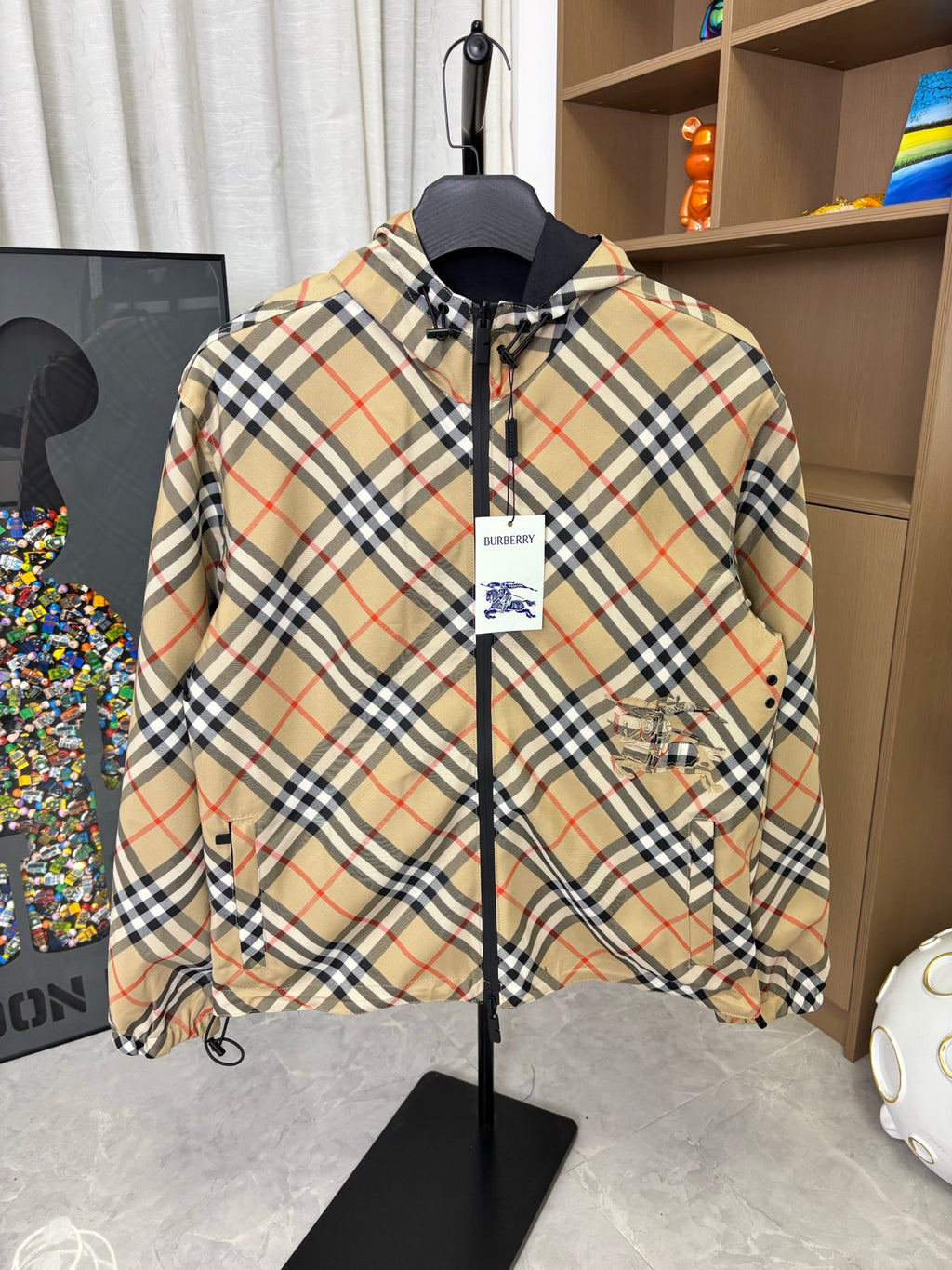 Burberry plaid hooded zip jacket, front view with chest pocket and logo tag