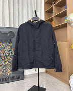 Navy hooded zip jacket with stand collar and elastic cuffs