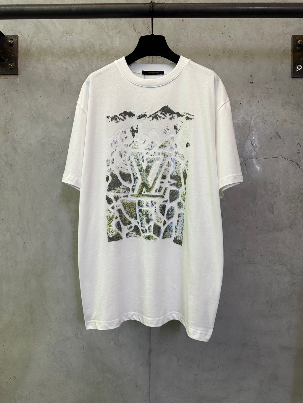 White crewneck T-shirt with colorful graphic print on the front