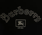 Close-up of Burberry logo embroidery with EST 1856 on black T-shirt