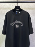 Black crewneck short-sleeve T-shirt with large Burberry logo and emblem